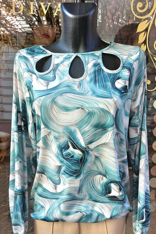 Türkiz elegáns, alkalmi női felső ezüst csillogó mintával. Gumis aljú.