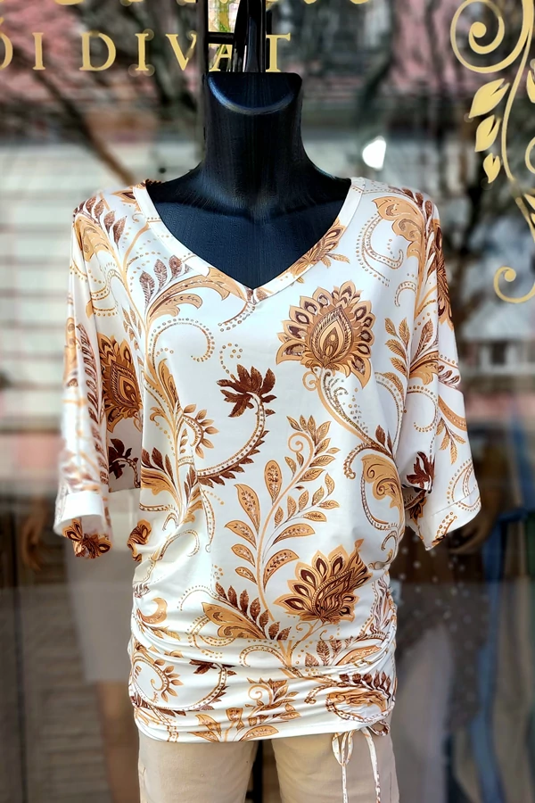 Elegáns alklami beige színű női tunika, felső, fehér alapon aranybarna mintás